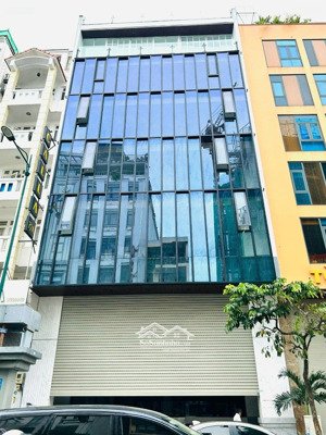 tòa nhà khu trần não 10x20m hầm trệt 5 lầu cho thuê