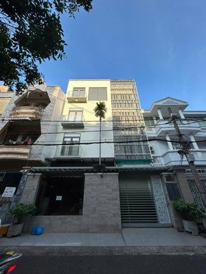cho thuê nhà mt phổ quang, ngay bệnh viện. dt: 8x20m. 1 trệt 4 lầu. thang máy. nhà mới. giá 55tr