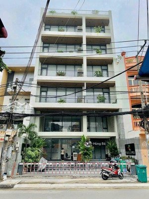 bán gấp! tòa nhà góc 2 mặt tiền hà huy giáp - dt: 19 x 29m - 7 tầng - hđt: 230 tr. giá chỉ 55 tỷ