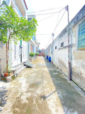 cần bán nhà mặt tiền đường vĩnh phú 14, diện tích 102m2 trệt lững,sổ hồng riêng. giá đầu tư