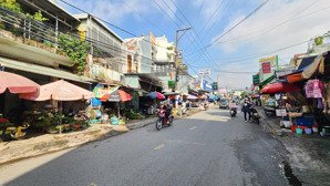 bán nhà trệt lầu , mt chợ, kinh doanh tự do. đang có thu nhập 15 triệu/ tháng