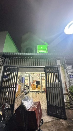 bán nhà trệt lầu kiên cố giá rẻ gần chợ tân long, tân đông hiệp, dĩ an