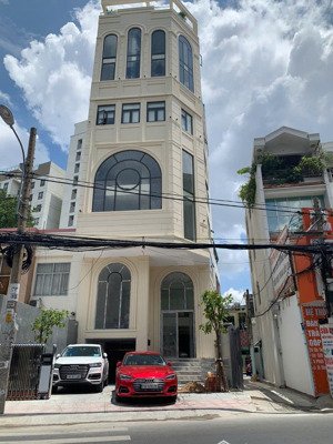 cho thuê nhà mới mặt tiền đường lê quang định, phường 11, quận bình thạnh. dt 8x24m hầm 8 lầu tm