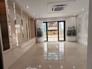 bán nhà mặt phố đông quan cầu giấy 6 tầng thang máy ô tô tránh, thông sàn, gara. 60m2 mt 5,5m