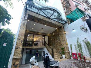 cho thuê nhà mặt đường trung kính, dt 135m, 9 tầng, mt 6.5m, thông sàn, thang máy, 180tr/tháng.