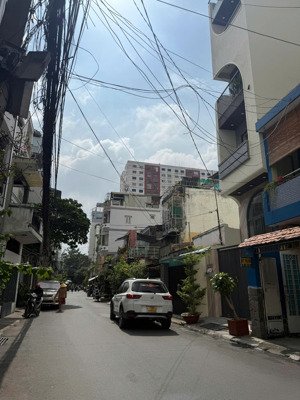 bán nhà hẻm xe hơi đang làm căn hộ dịch vụ bùi hữu nghĩa.bình thạnh(5x15m) 4 tầng 6pn giáp quận 1 .