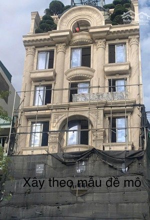 cực đẹp tòa building lô góc mặt pháo đài láng dt 70m2 xây 8 tầng giá 42 tỷ