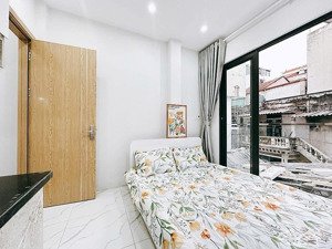 chủ đáo bank bán tòa nhà chdv phạm văn đồng 102m,7 tầng với 21 pkk dt 120tr/thg ngõ thông, ô tô