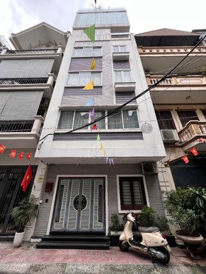 nhanh thì còn !! toà nhà 7 tầng phố quần ngựa- mt: 6m - ô tô tránh , vỉa hè - 2 thoáng - kinh doanh