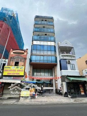 bán toà nhà mặt tiền phổ quang quận tân bình,dt:nh 10x20m,xd hầm 6 tầng thu nhâp 250tr giá 30 tỷ