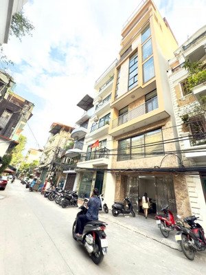 bán toà nhà 8t, dt 110m2, 17ph khép kín, cho thuê 150tr/th, lô góc, ô tô tránh, phố nguyễn thị định