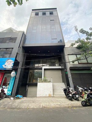 tòa vp ốp kính cực đẹp, khu nguyễn văn trỗi, pn. dt: 8x18 - đủ 144m2, kc 8 tầng. hdt 200tr - 65 tỷ