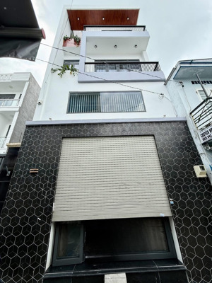nhà phố đẹp 5,2m x13m.xây 1 lửng,2 lầu hẻm nhựa ô tô thông l3,phường thới an.q12.lh : 