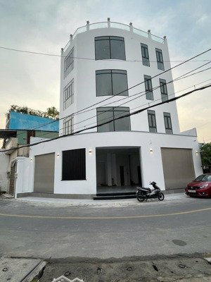 nhà mặt tiền, căn góc có thang máy 12x10m 5 tầng btct. vị trí đỉnh mỹ huề. shr full thổ