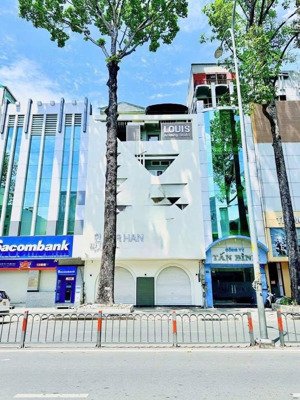 cho thuê nhà mt đường ba tháng hai,q10 (ngang 9mx18m )trệt lửng 3 lầu_giá 180 triệu
