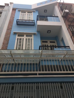 nhà hẻm xe hơi sau lưng mặt tiền phan văn trị p5 đối điện emark- dt 4.5x14m 1 tr 2 lầu- 7.8tỷ tl