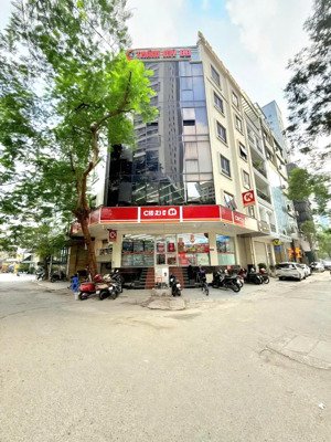 bán nhà mặt phố trần thái tông, cầu giấy, 105m2 x 10 tầng thang máy, lô góc, vỉa hè, kd đỉnh