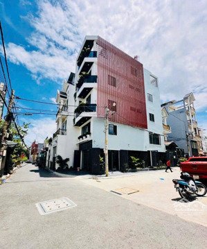 siêu phẩm lô góc 2 mặt tiền - 5 tầng - full nt - thới an - nhỉnh 7t