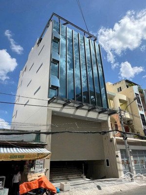 khu vip dành cho khách vip! tòa nhà hoàng việt, q.tb. dt: 8x22m-158m2, hầm 7 tầng. hđt 180tr. 45 tỷ