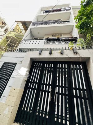 hẻm xe hơi thông, nhà 4 tầng 56m2 ngang khủng 5.2m, gần phạm văn đồng