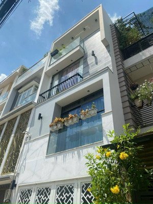 nhà mới lê quang định ô tô ngủ trong nhà, phường 7, q. bình thạnh dt: 4,5x16m 4pn 5wc giá: 12,x tỷ