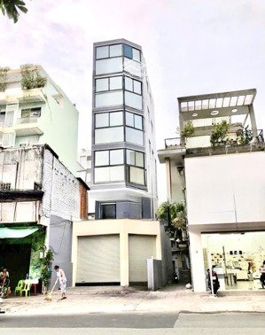 siêu phẩm nhà mặt kính cực hot 178 cmt8 - nhà mặt tiền đẹp chảnh chọe - 6 tầng thang máy giá50triệu