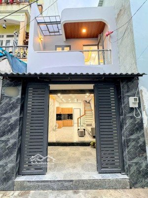 nhà mới đẹp ở liền hẻm thông 369/25 lê văn quới trệt lầu 4 tỷ 9 bl