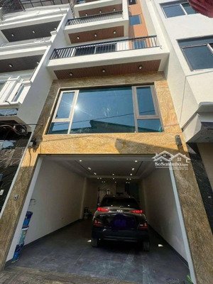 toà vp tôn đức thắng, dt 1,2 tỷ/năm, 2 ô tô tránh, 7t thang máy dt 70m2 mt 6,5m, 26,8 tỷ