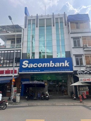bán tòa nhà ngân hàng sacombank mt hoàng hoa thám dt: 9x25m giá 65 tỷ. lh: em mưa