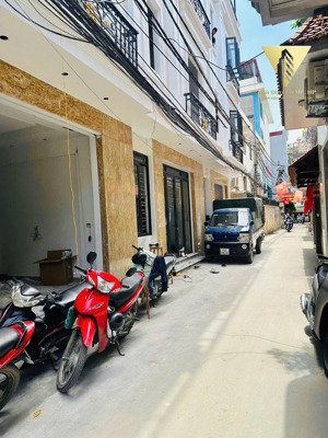 nhà 4 tầng mặt ngõ trần nguyên hãn - oto đỗ cửa - ngõ thông kinh doanh buôn bán - lô góc 2 thoáng
