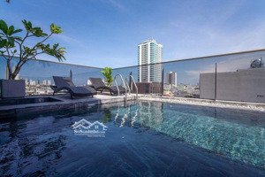 bán tòa căn hộ, khách sạn 9 tầng 2 mặt tiền đường 10m5 gần trần hưng đạo, ngay cầu rồng
