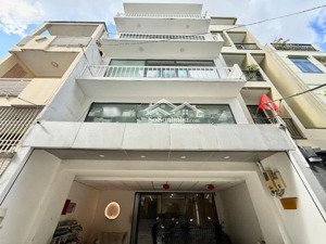 nhà mt ngang 7 dài 15 - sẵn hđ thuê 72 triệu/tháng cn 105 m thang máy 5 tầng huỳnh bánh phú nhuận