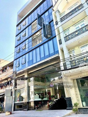 bán tòa nhà văn phòng 6 lầu + 1 hầm,(12mx17m) ngang 12m trung tâm tân phú, gần aeon