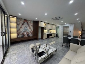 bán nhà 7 tầng mặt ngõ kinh doanh gara ô tô thang máy nguyễn đức cảnh 20,8 tỷ