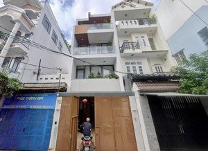 bán gấp nhà mt 266 nguyễn hồng đào, 140m2, có thang máy, chốt 26,5 tỷ 