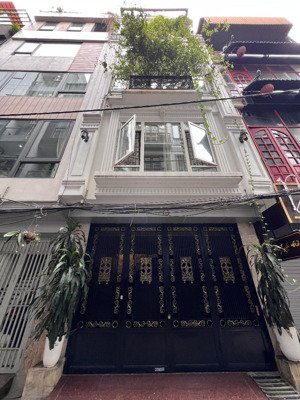 hàng kín tây sơn - phân lô - ô tô tránh - gara - 5 tầng - nhà đẹp - sát mp phố - kinh doanh