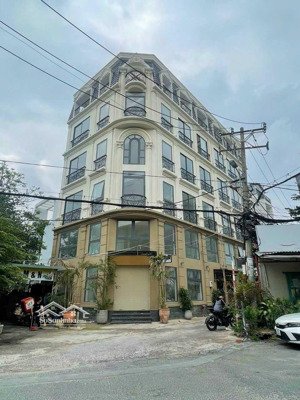 nhà đẹp - giá tốt! góc 2 mặt tiền phổ quang (7x26m), hầm 5 tầng, hđt 110tr/tháng - giá chỉ 26,5 tỷ