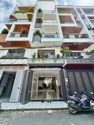 nhà đường thông thới an 16, dt:4x19m, lửng, 3lầu, gara ôtô, 4pn, 6vs, p/thờ, sân thượng, 7,68 tỷ