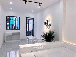 hẻm xe hơi phan xích long 5 tầng 8pn dòng tiền 40tr/th giá 11.x tỷ