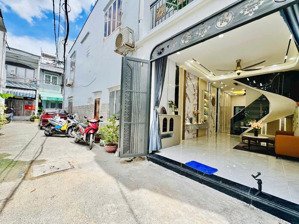 vị trí đẹp,nhà cũng sang. nhà 58m² điện biên phủ xây 1 trệt 2 lầu, hẻm oto gần vòng xoay lý thái tổ