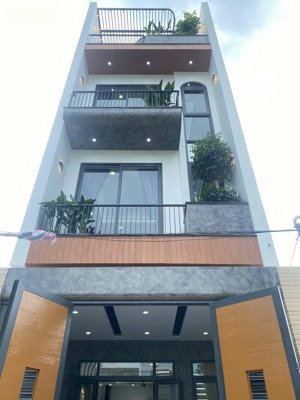 bán căn nhà mới 100% 4tầng có gara oto trong nhà, full nội thất, thiết kế hiện đại, không gian mở