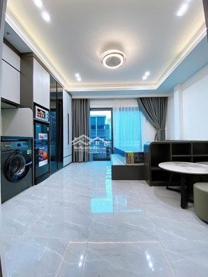 ccmn lạc long quân, nghĩa đô, ô tô đỗ cửa, 65m2 x7 tầng thang máy, 11pkk, dòng tiền 700 tr/năm.