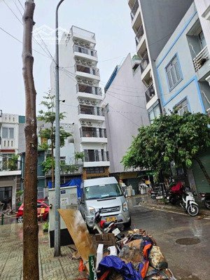b.á.n tòa ccmn 8_tầng - thang máy - lô góc - vỉa hè - kinh doanh - ô tô dừng đỗ vào nhà - full đồ