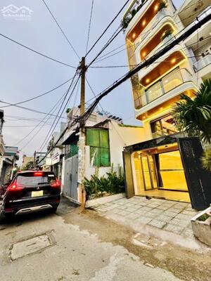 Bán nhà 128/47 Bùi Quang Là, 1 trệt lửng 4 lầu, thang máy. Giá 12,5 tỷ TL