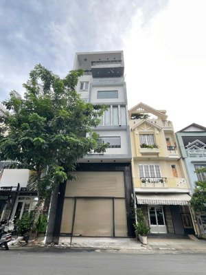 mặt tiền cửu long 7,5m ngang - nhà mới có thang máy.