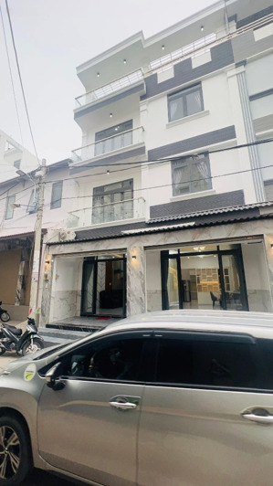 bán nhà mới mặt tiền đường xe hơi hẻm huỳnh tấn phát dt 96m2 cách phú mỹ hưng 10phút. lh 