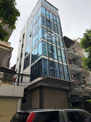 cho thuê nhà trần vỹ , dt 70m, 7 tầng, mt 6m, thông sàn, thang máy, 65tr/tháng.