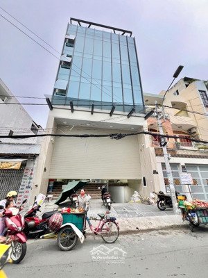 tòa nhà văn phòng mặt tiền đường 15 cạnh chợ tân quy q7