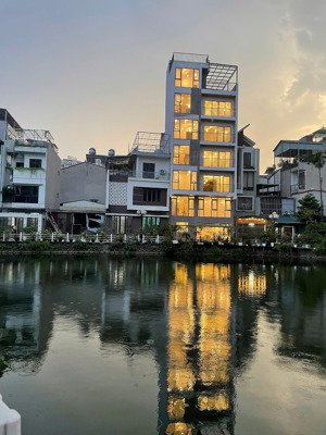 bán gấp nhà mặt hồ trung kính - 110 trần duy hưng, 125m2 - mt 8.3m - ô tô tránh, giá: 52 tỷ