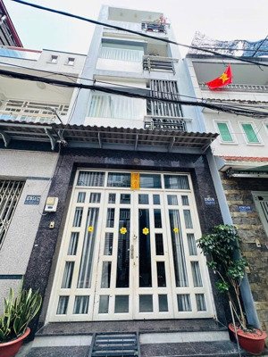 nhà đẹp. giá tốt 870/54/10 lạc long quân, dt : 4x12m. 4 tầng mới. chỉ 7tỷ5. xe hơi tới nhà